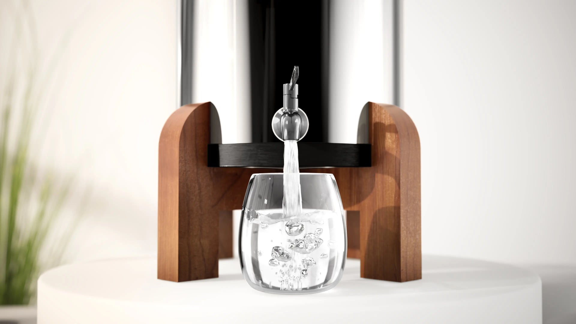 Wooden water dispenser with glass on a white surface